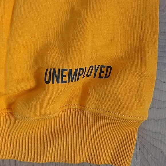 unemployed sweater orange